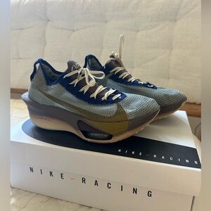 Nike Men’s Racing Sneakers in Light Gray, Navy,‎ Olive, and Cream